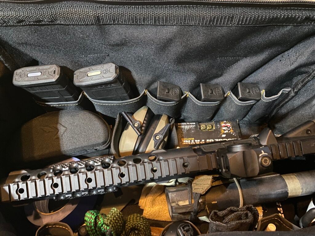 AR-15 magazines and pistol magazines in the interior pocket of the tool bag